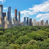 a view of a city with tall buildings