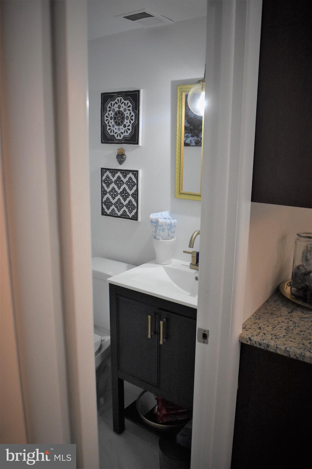 2742 West Country Club Road Philadelphia, PA 19131 - Photo 14 of 23 Powder Room (First Floor)