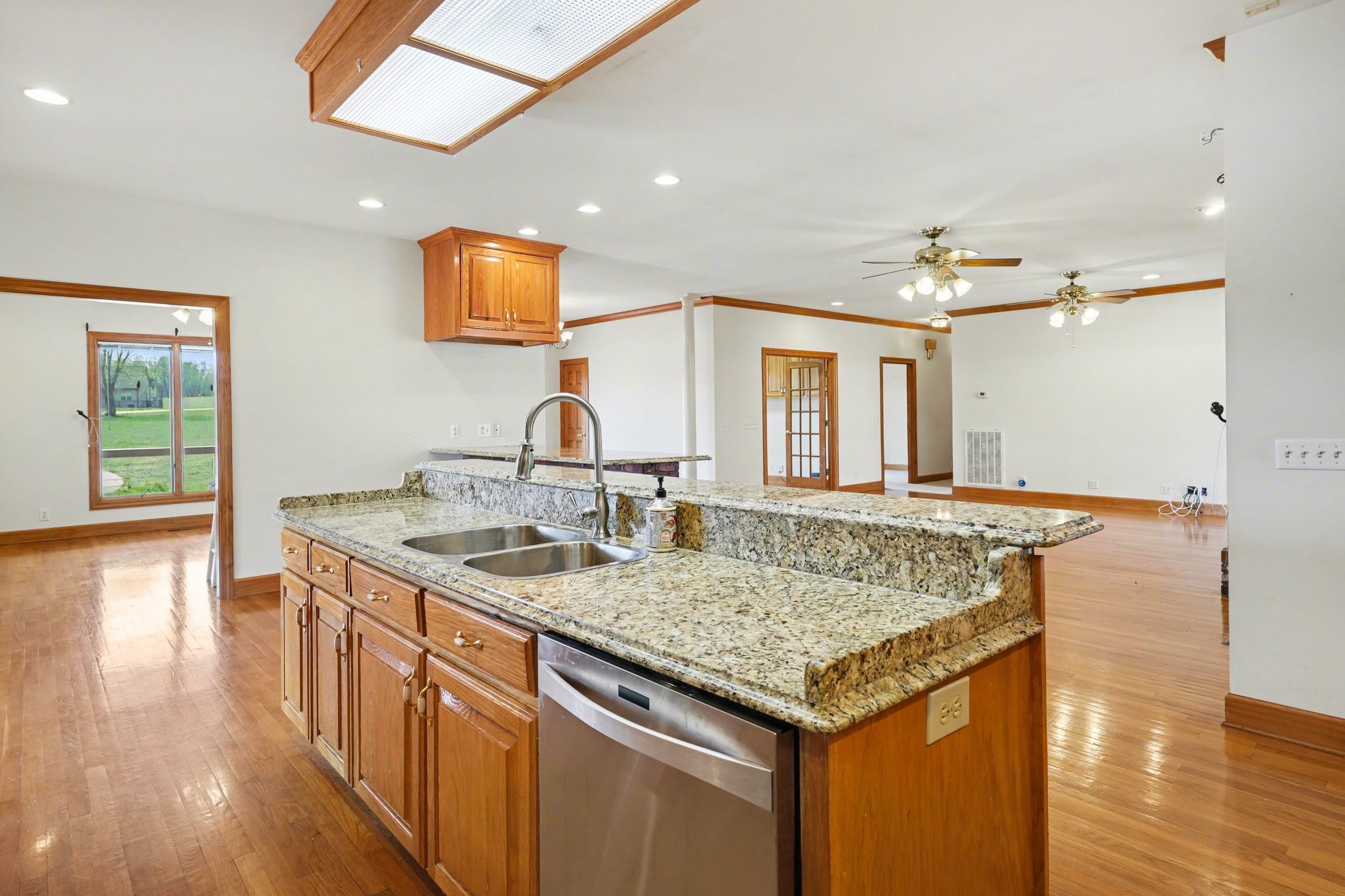 11948 Betts Road Greenbrier, TN 37073 - Photo 13 of 44 a kitchen with a sink and a wooden floor