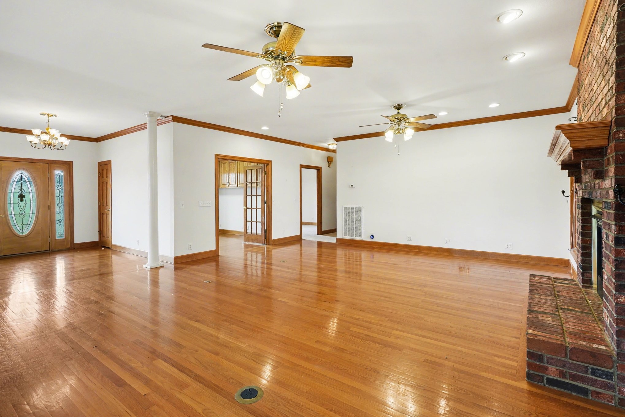 11948 Betts Road Greenbrier, TN 37073 - Photo 18 of 44 a view of an empty room with window and wooden floor