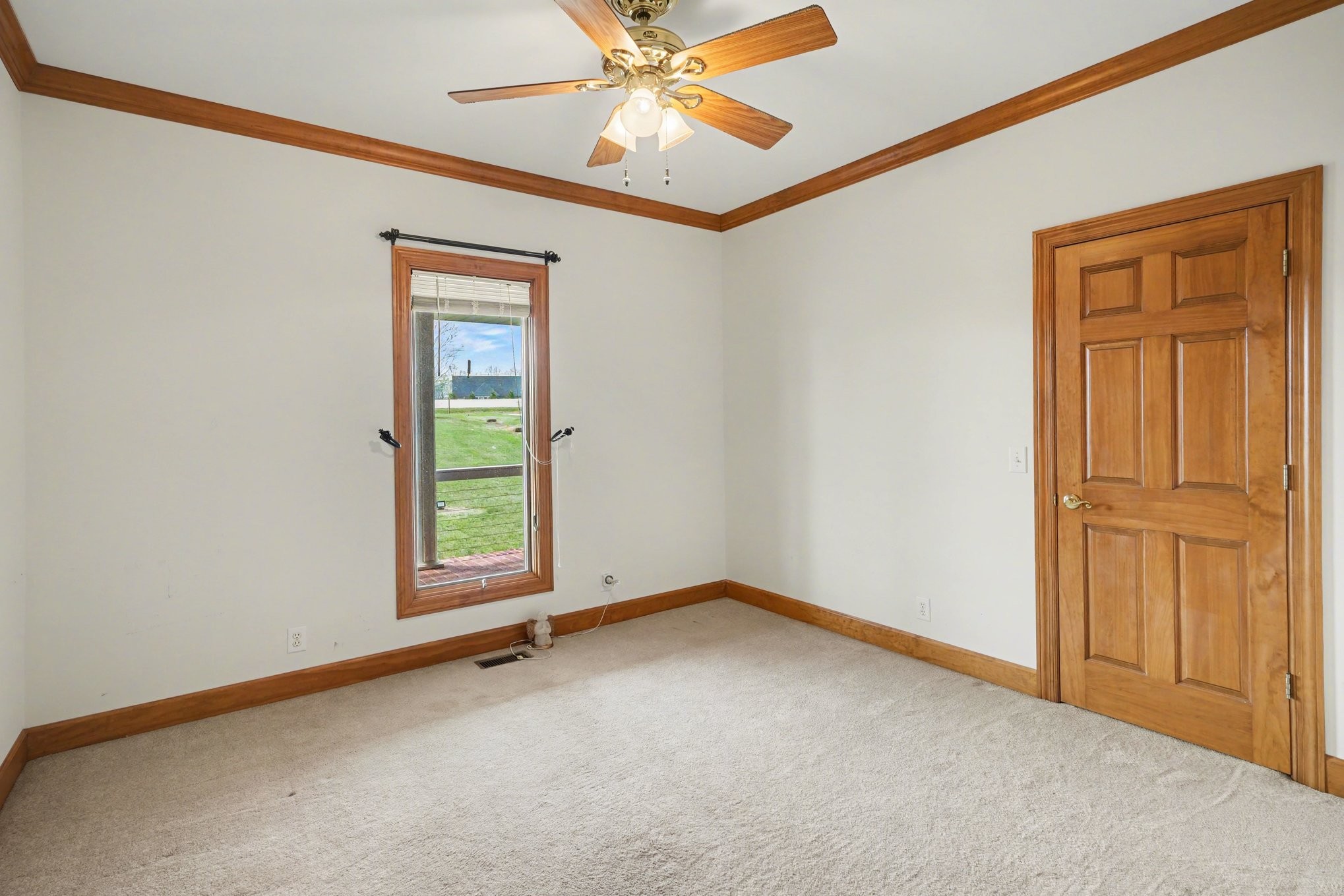 11948 Betts Road Greenbrier, TN 37073 - Photo 21 of 44 an empty room with windows and fan