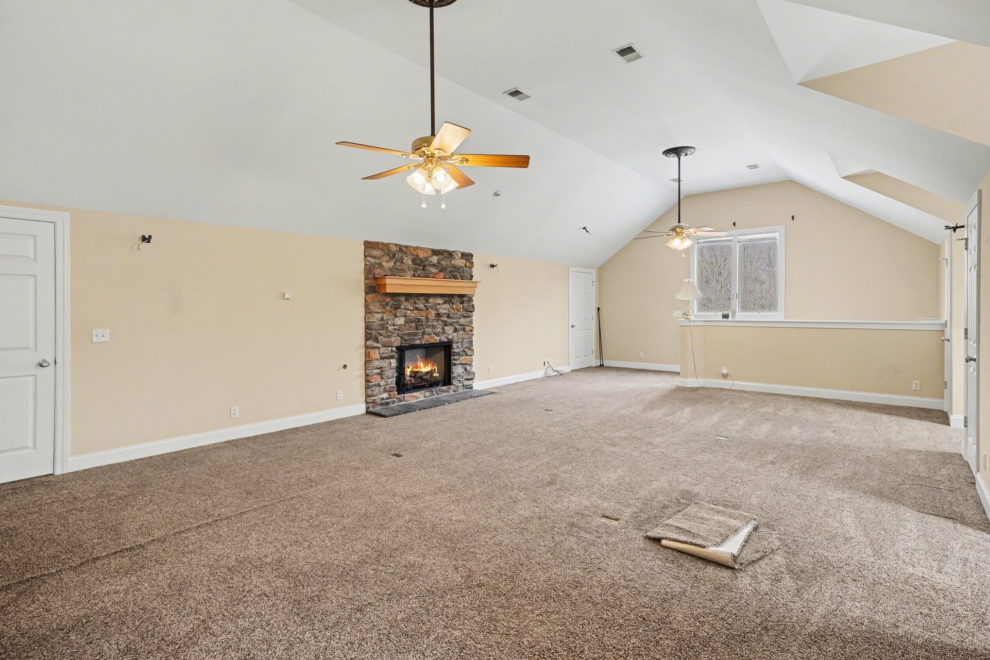 11948 Betts Road Greenbrier, TN 37073 - Photo 27 of 44 a view of empty room with a ceiling fan and window