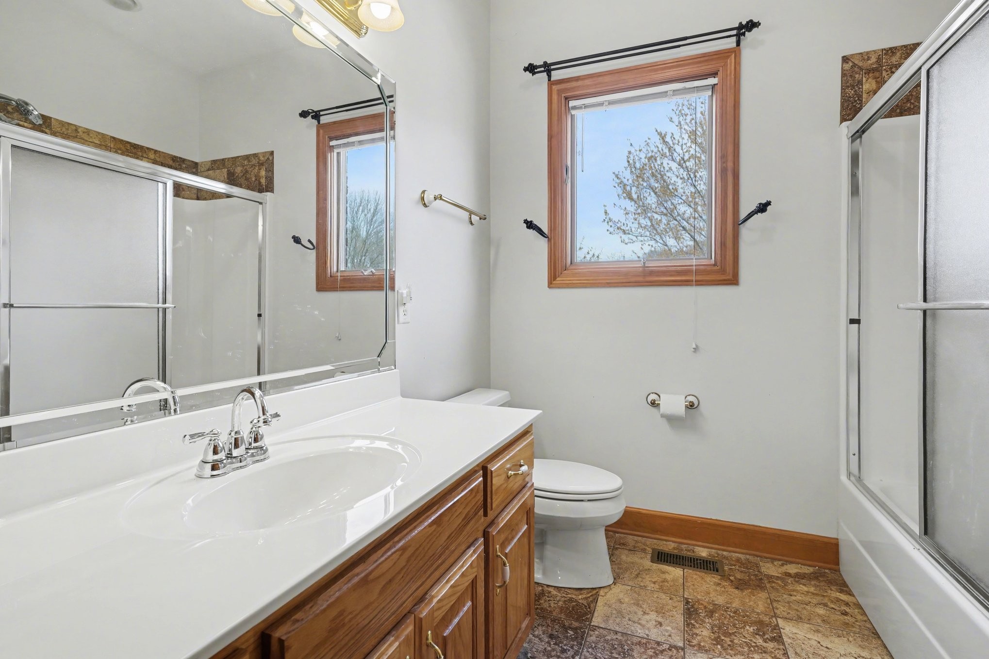 11948 Betts Road Greenbrier, TN 37073 - Photo 29 of 44 a bathroom with a sink and a mirror
