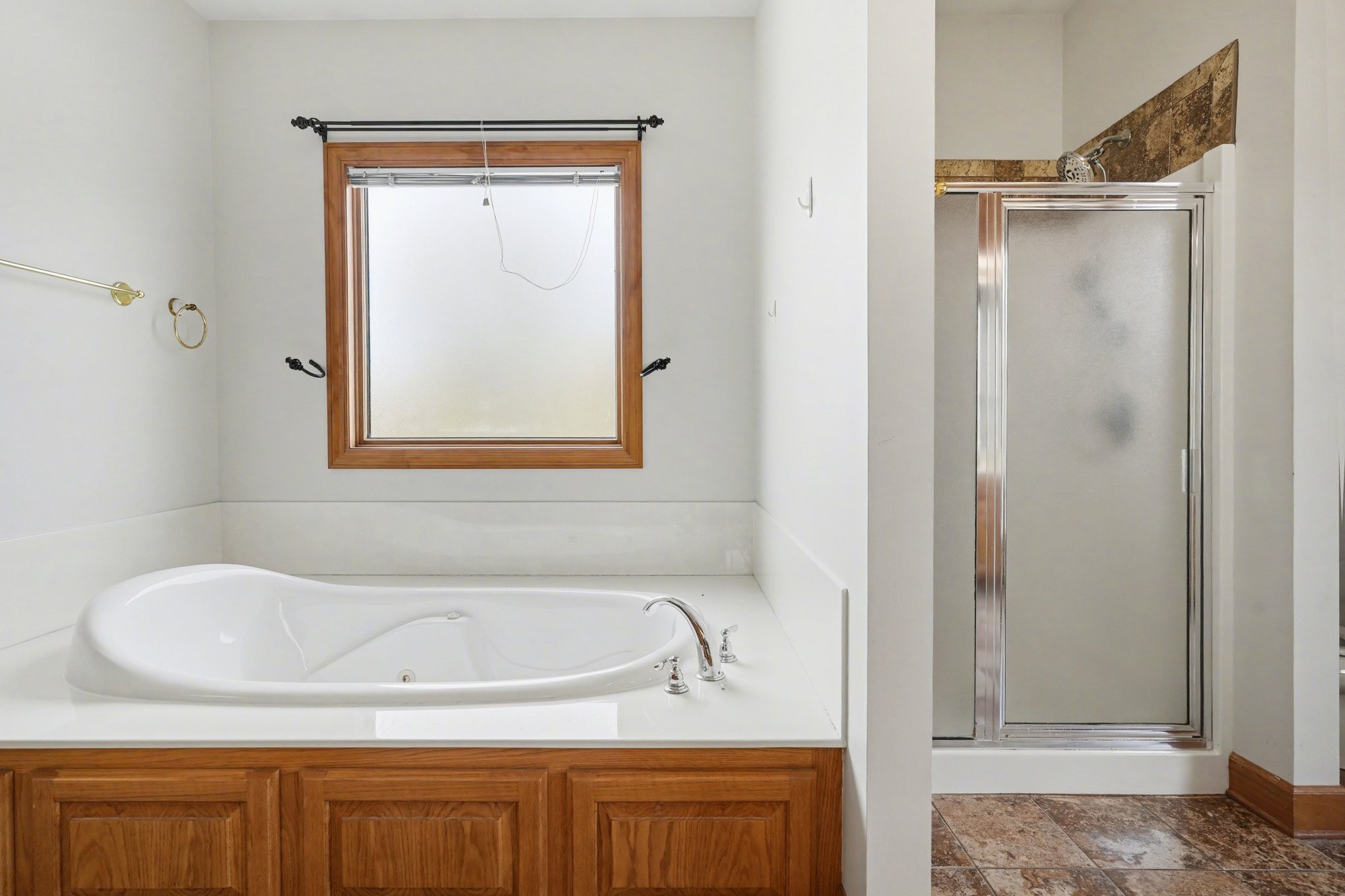 11948 Betts Road Greenbrier, TN 37073 - Photo 30 of 44 a bathroom with bathtub and shower
