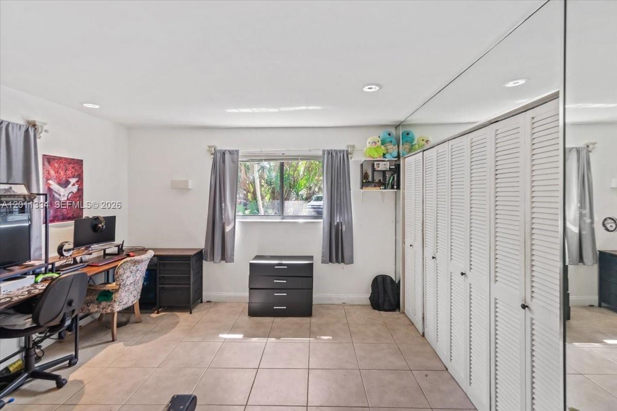 6385 Southwest 25th Street Miami, FL 33155 - Photo 12 of 28 a workspace with furniture and a window