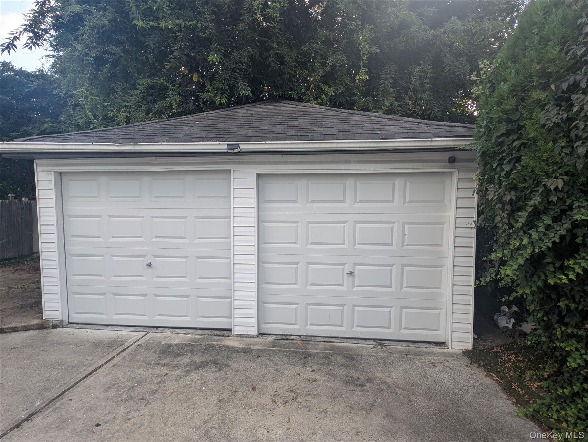 81 Cochran Place Valley Stream, NY 11581 - Photo 2 of 12 a view of a garage