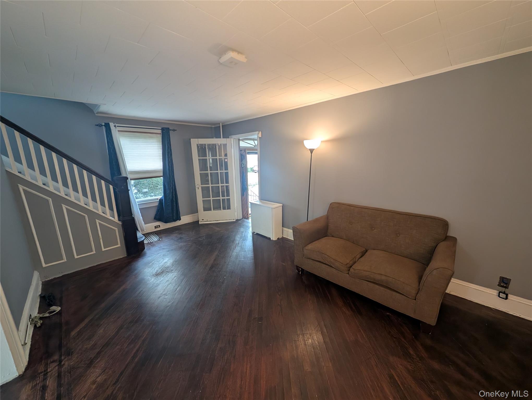 81 Cochran Place Valley Stream, NY 11581 - Photo 5 of 12 a living room with furniture and a wooden floor