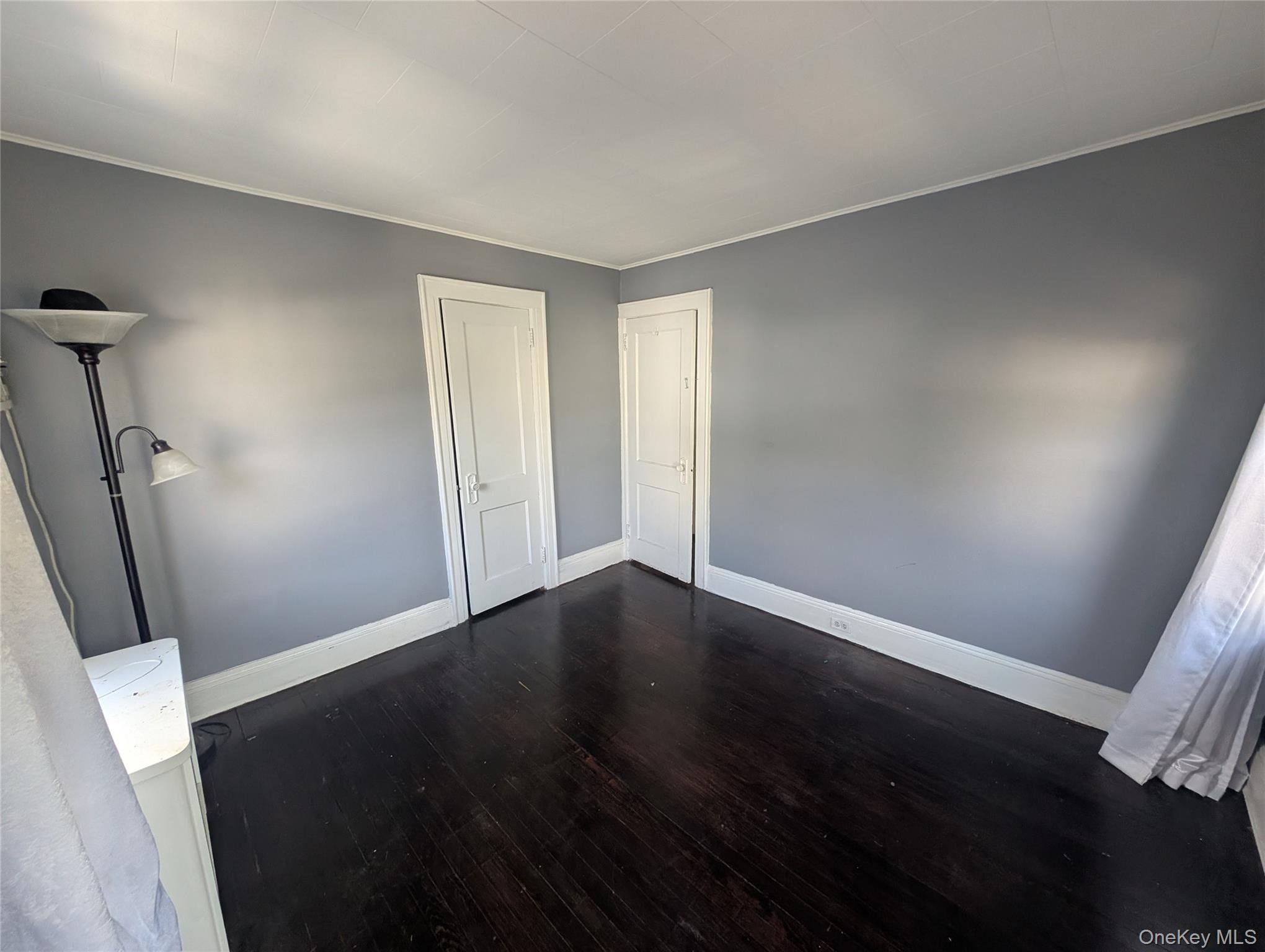 81 Cochran Place Valley Stream, NY 11581 - Photo 9 of 12 wooden floor in an empty room