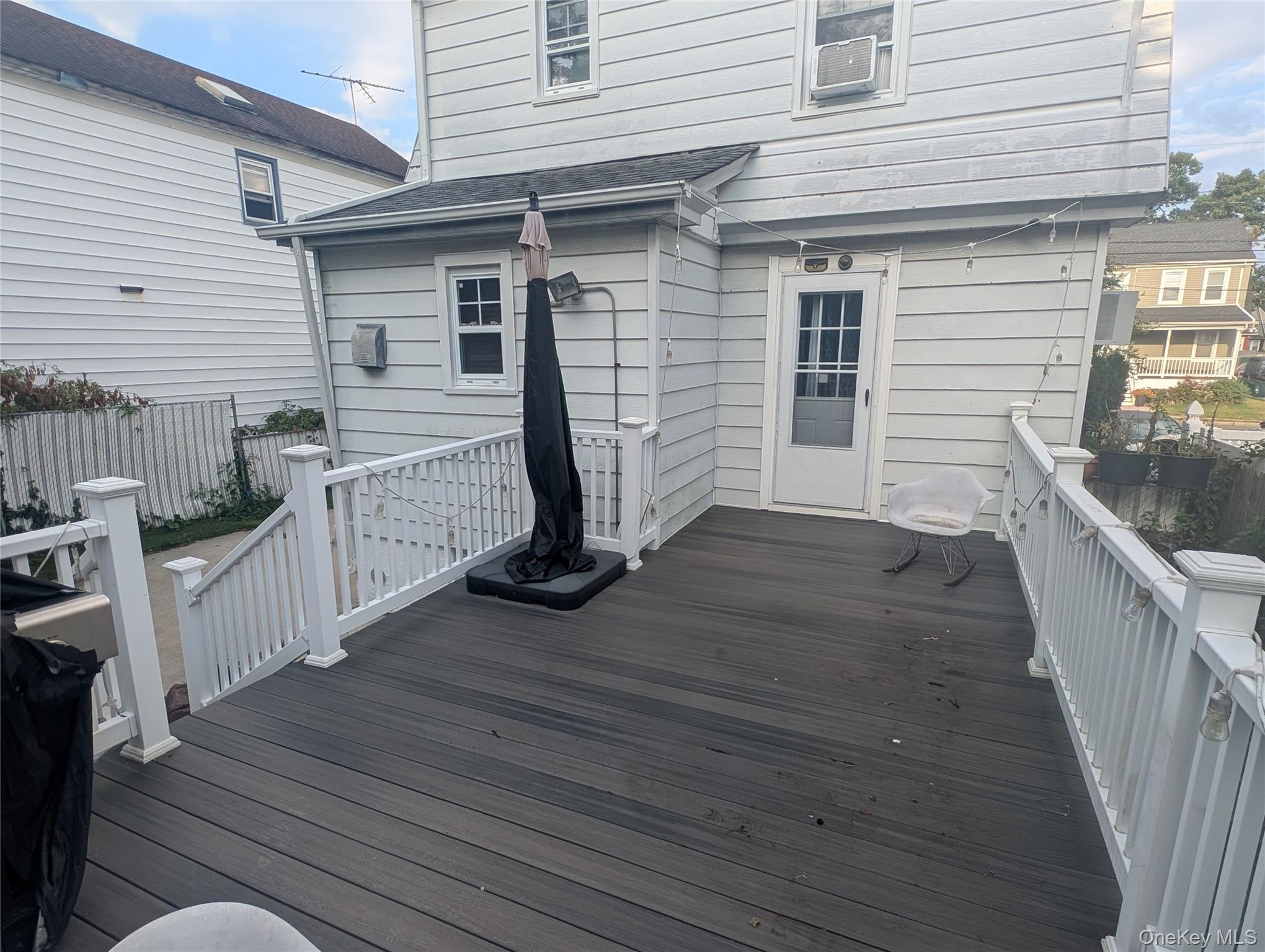 81 Cochran Place Valley Stream, NY 11581 - Photo 10 of 12 a view of deck and deck with wooden floor