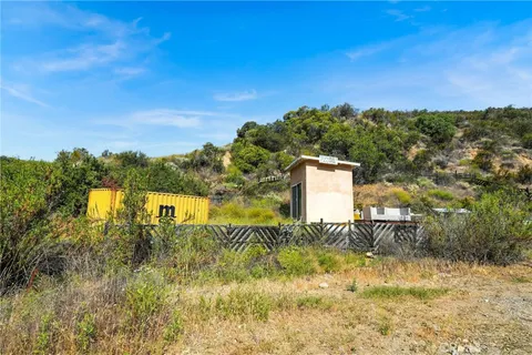 a view of a road with a yard