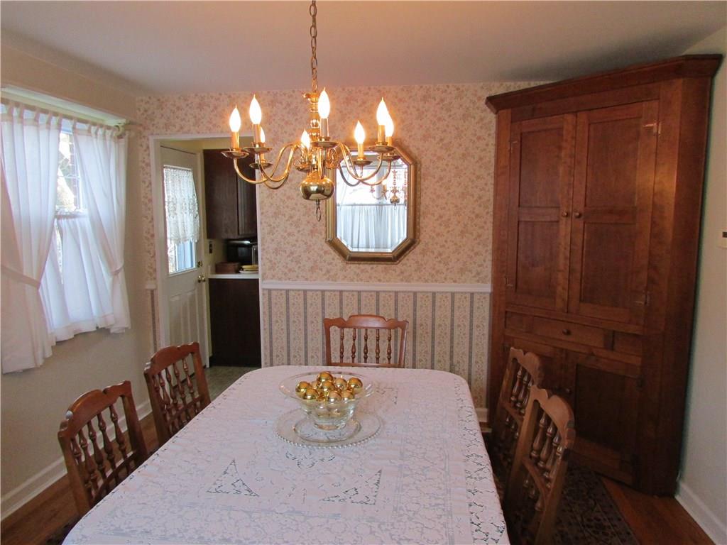 1136 Varner Road Whitehall, PA 15227 - Photo 5 of 25 Another view of the large formal dining room with more hardwood floors, large windows, and classic colonial chandelier.