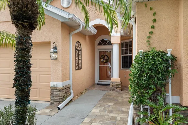 a view of a house with a potted plants