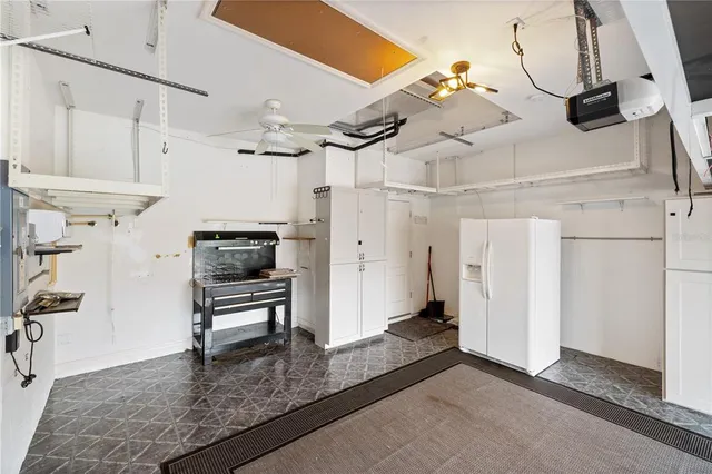 a view of a livingroom with furniture and a flat screen tv