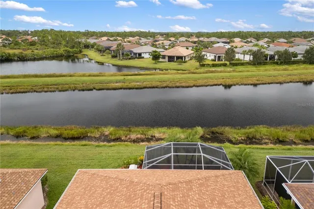 a view of a city with an ocean