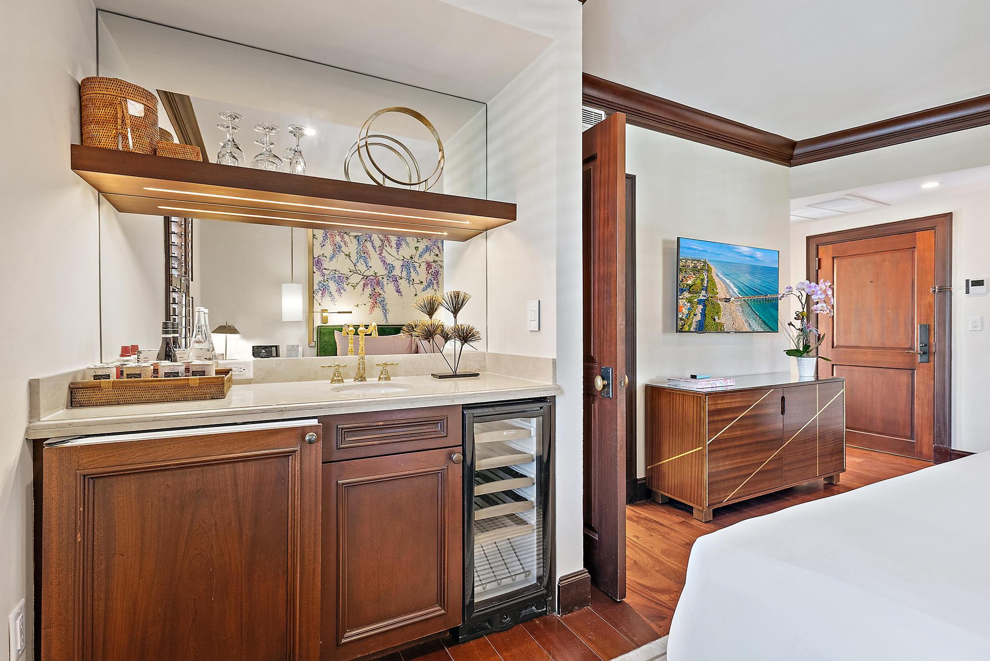 301 Australian Avenue, Unit 305 Palm Beach, FL 33480 - Photo 7 of 19 a kitchen with cabinets and window