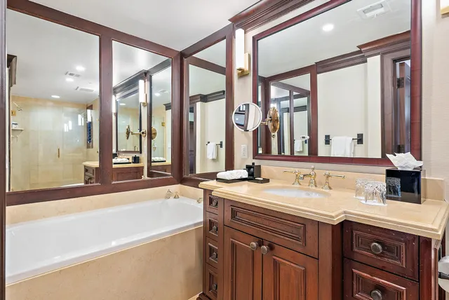 a bathroom with a bathtub and a sink