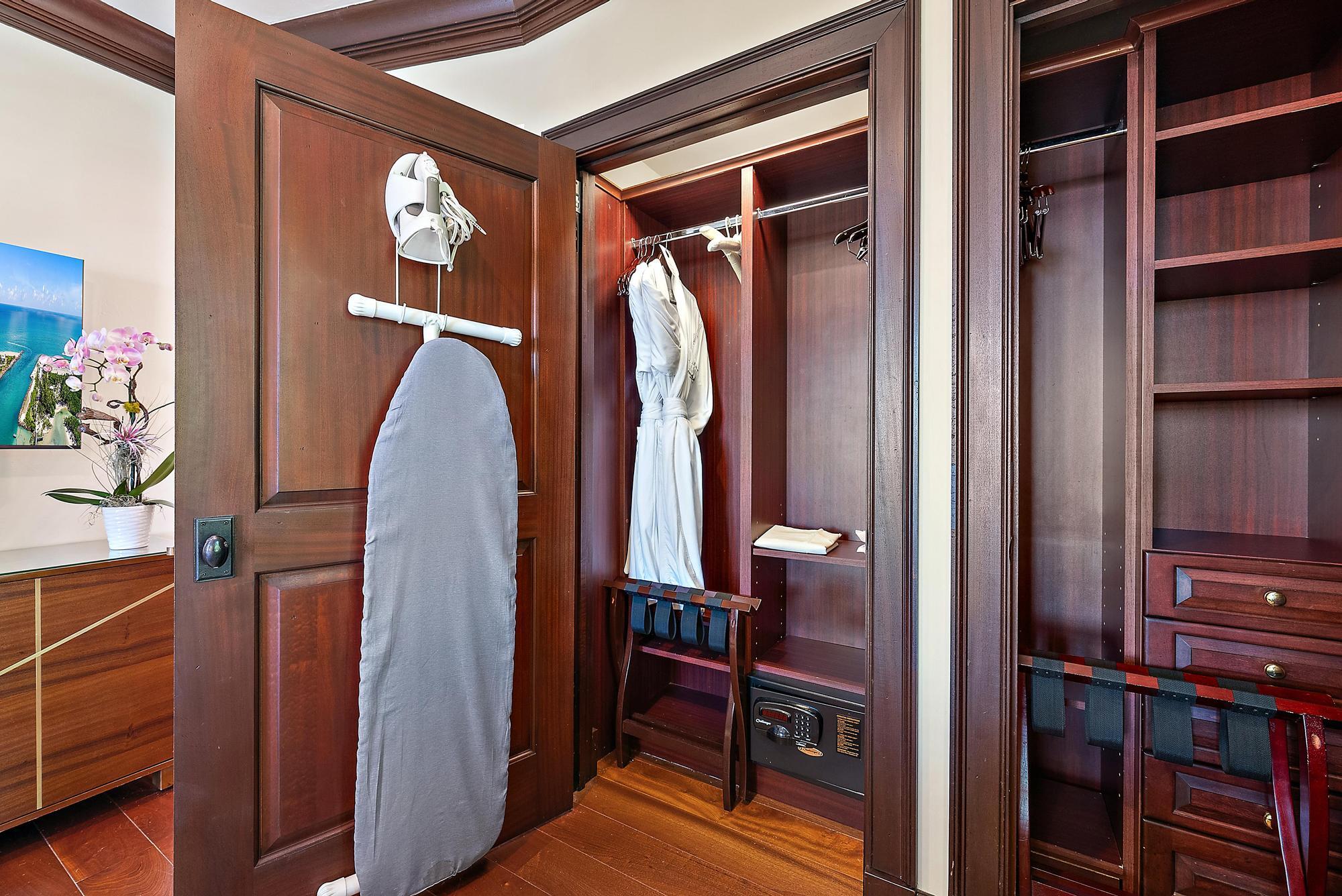 301 Australian Avenue, Unit 305 Palm Beach, FL 33480 - Photo 10 of 19 a view of walk in closet with clothes and shoes