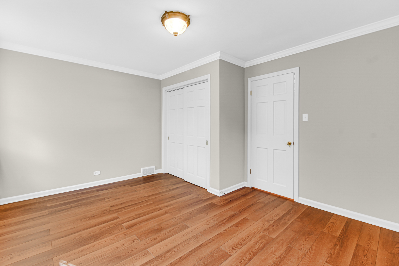 106 Cornwall Drive Crete, IL 60417 - Photo 13 of 29 a view of empty room with wooden floor