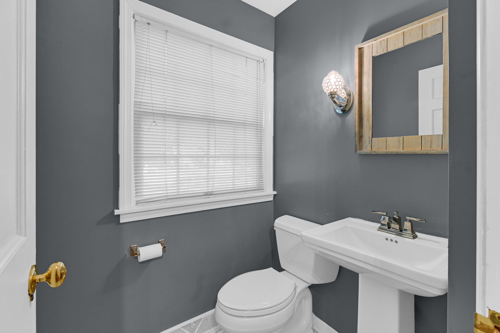 106 Cornwall Drive Crete, IL 60417 - Photo 14 of 29 a bathroom with a sink a toilet and mirror