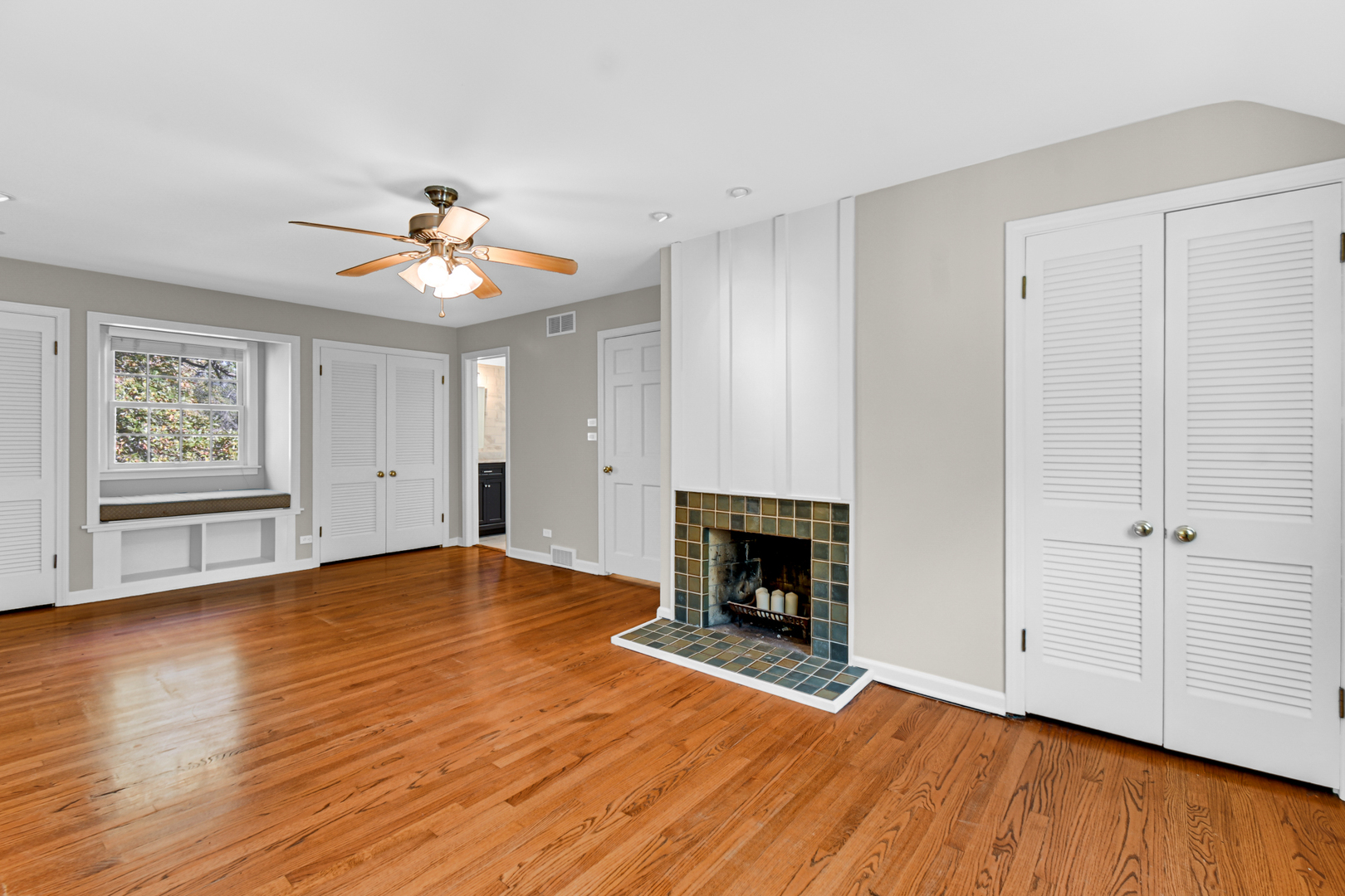 106 Cornwall Drive Crete, IL 60417 - Photo 16 of 29 an empty room with windows and fireplace