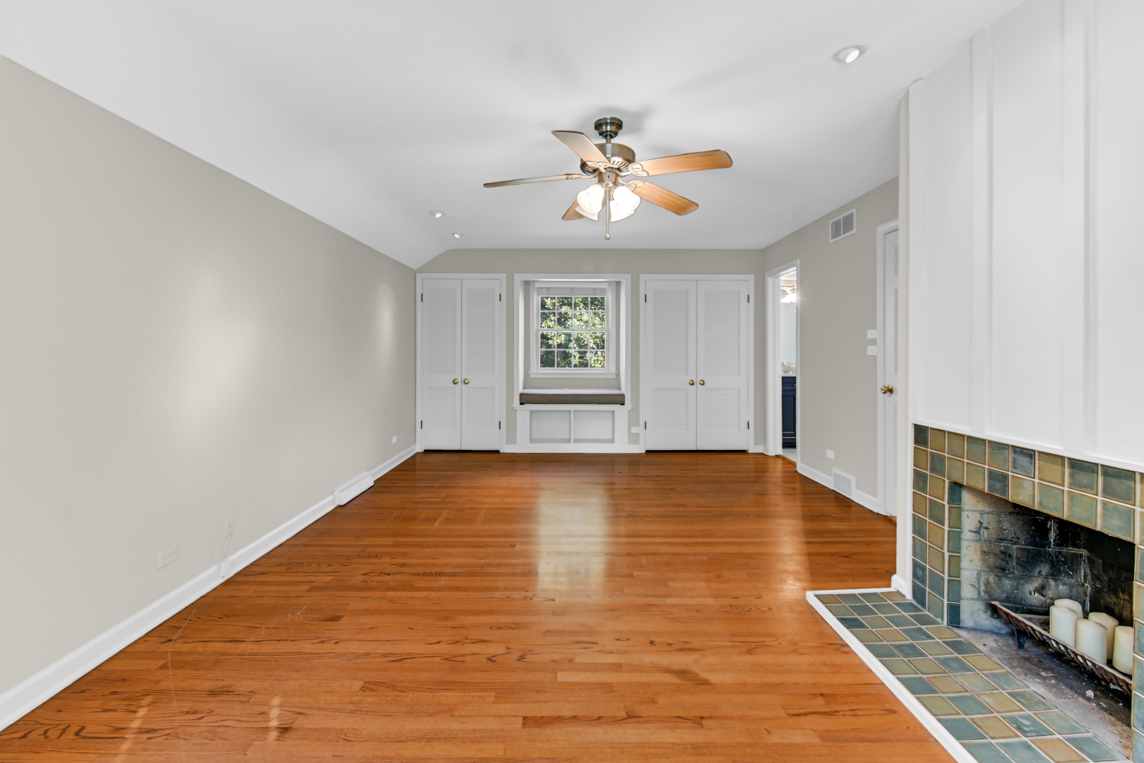 106 Cornwall Drive Crete, IL 60417 - Photo 17 of 29 a view of empty room with wooden floor and fan