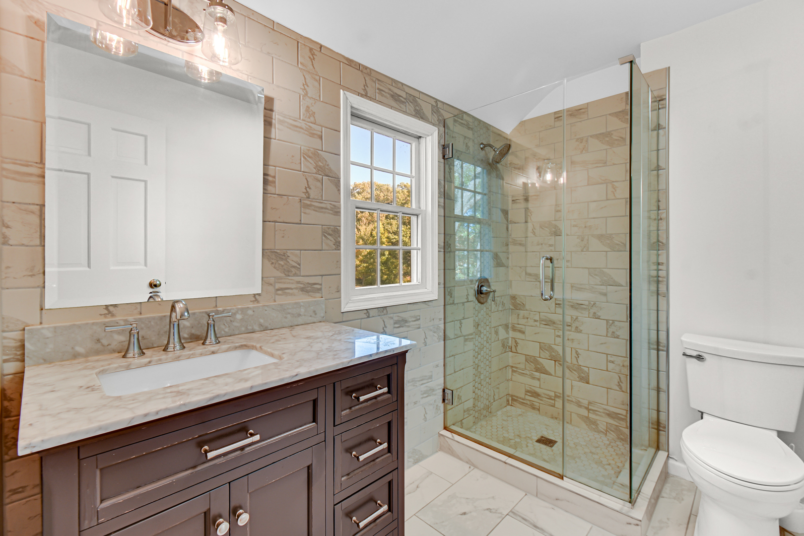 106 Cornwall Drive Crete, IL 60417 - Photo 19 of 29 a bathroom with a shower sink vanity and toilet