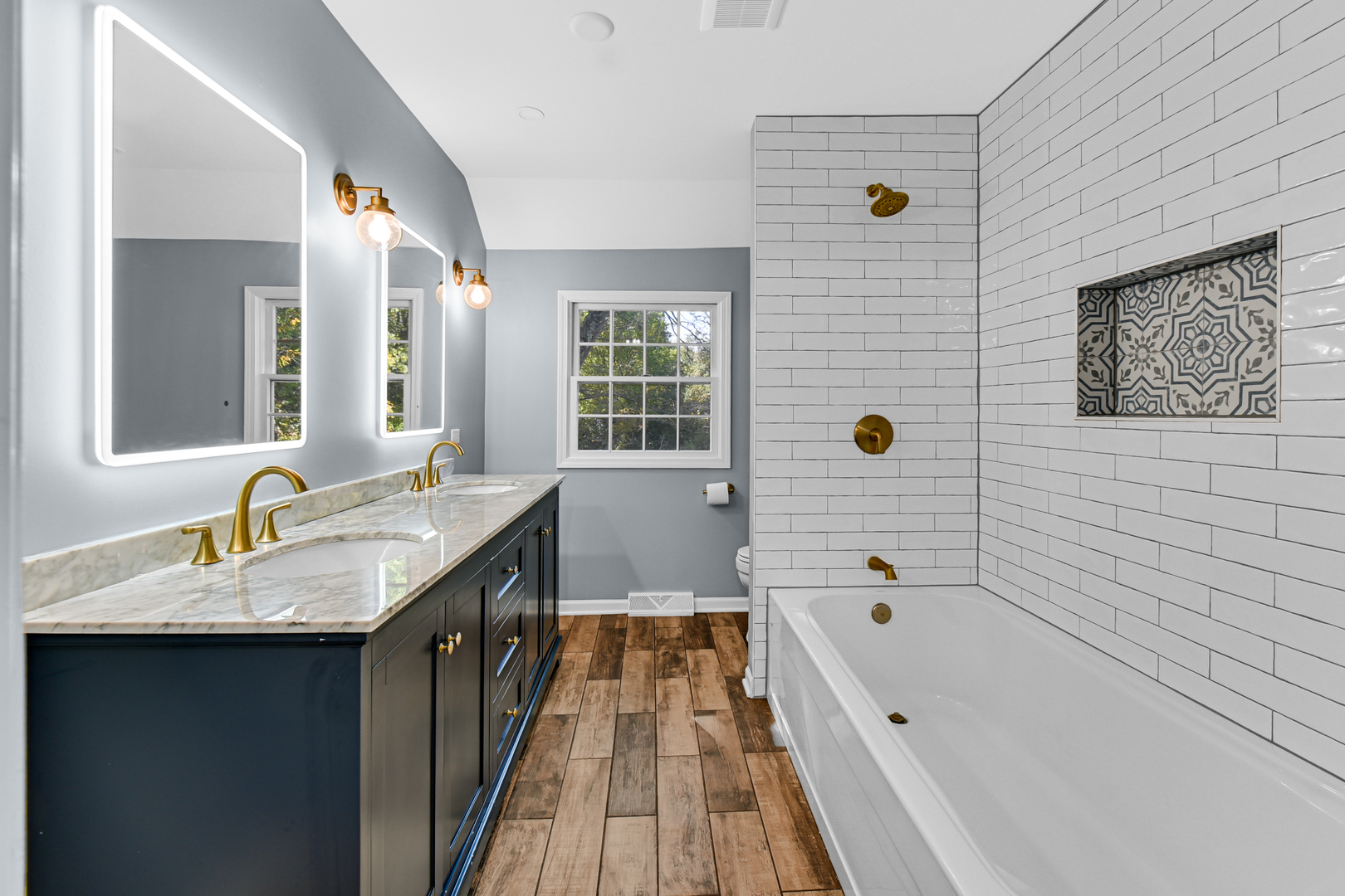 106 Cornwall Drive Crete, IL 60417 - Photo 21 of 29 a bathroom with a granite countertop sink a mirror a bathtub and shower