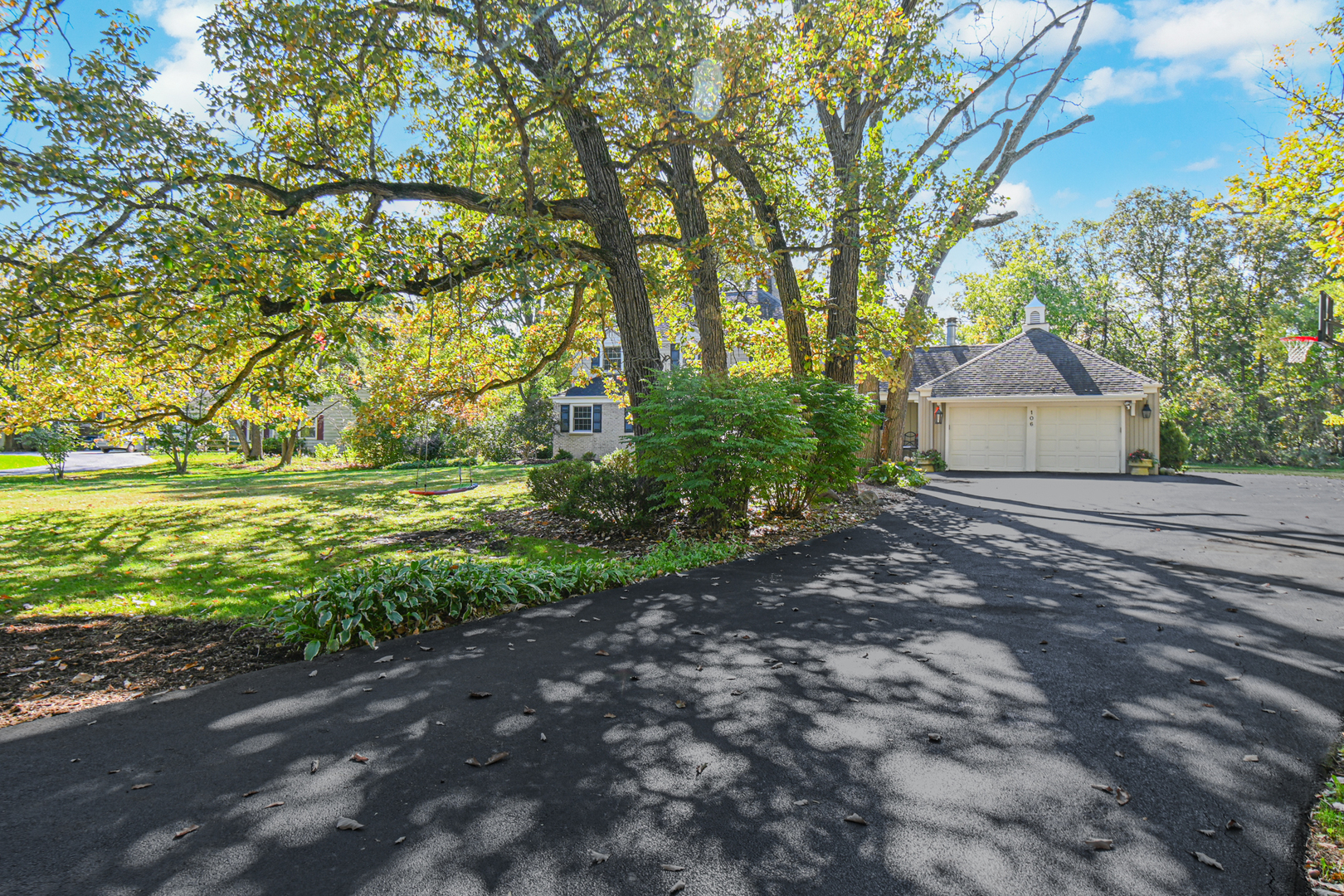 106 Cornwall Drive Crete, IL 60417 - Photo 27 of 29 a backyard of a house with a yard and outdoor seating
