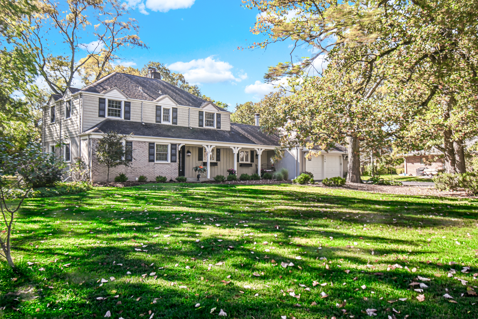 106 Cornwall Drive Crete, IL 60417 - Photo 3 of 29 a front view of a house with a garden