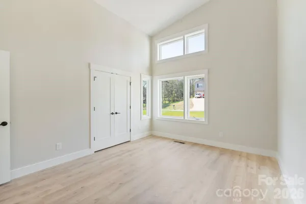 an empty room with windows