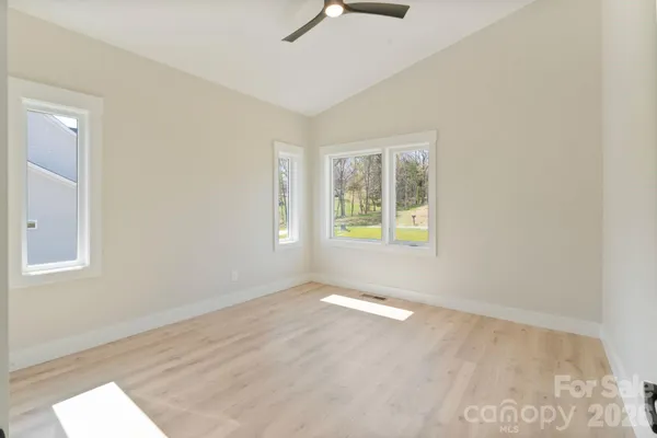 an empty room with windows