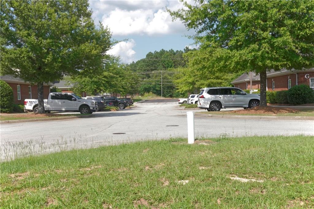2151 Eatonton Road Madison, GA 30650 - Photo 16 of 16 a view of street with parked cars