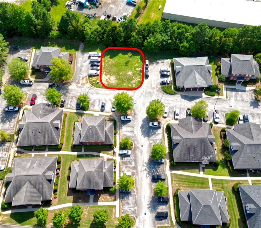 2151 Eatonton Road Madison, GA 30650 - Photo 3 of 16 an aerial view of houses and swimming pool