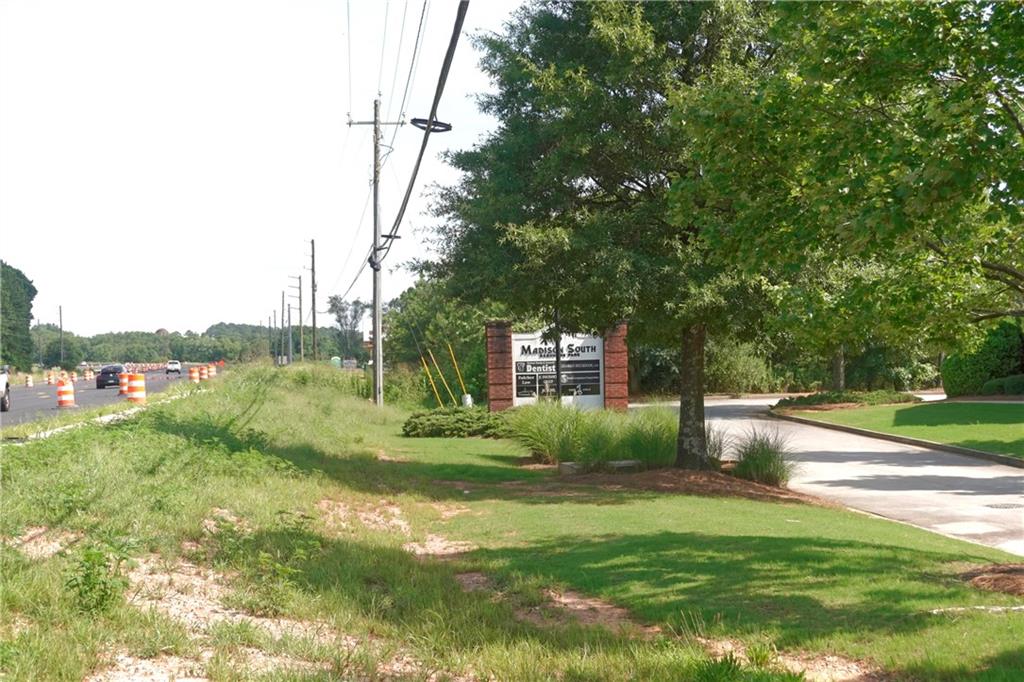 2151 Eatonton Road Madison, GA 30650 - Photo 9 of 16 a view of a garden with a fountain
