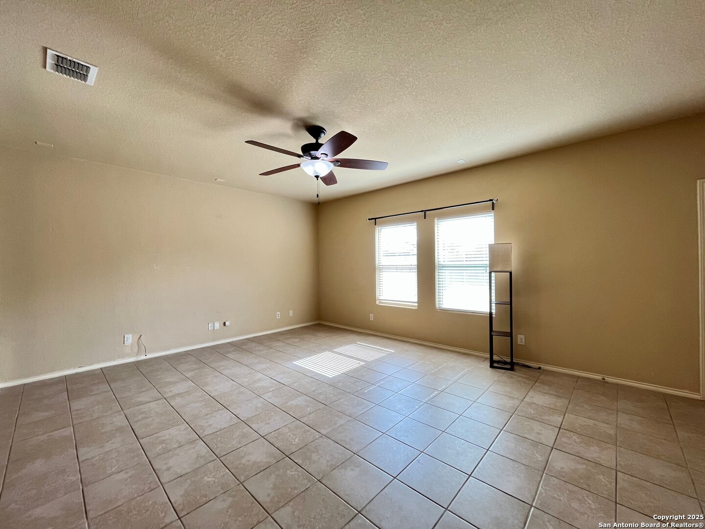 426 Tequila Ranch San Antonio, TX 78245 - Photo 11 of 25 a view of an empty room and window