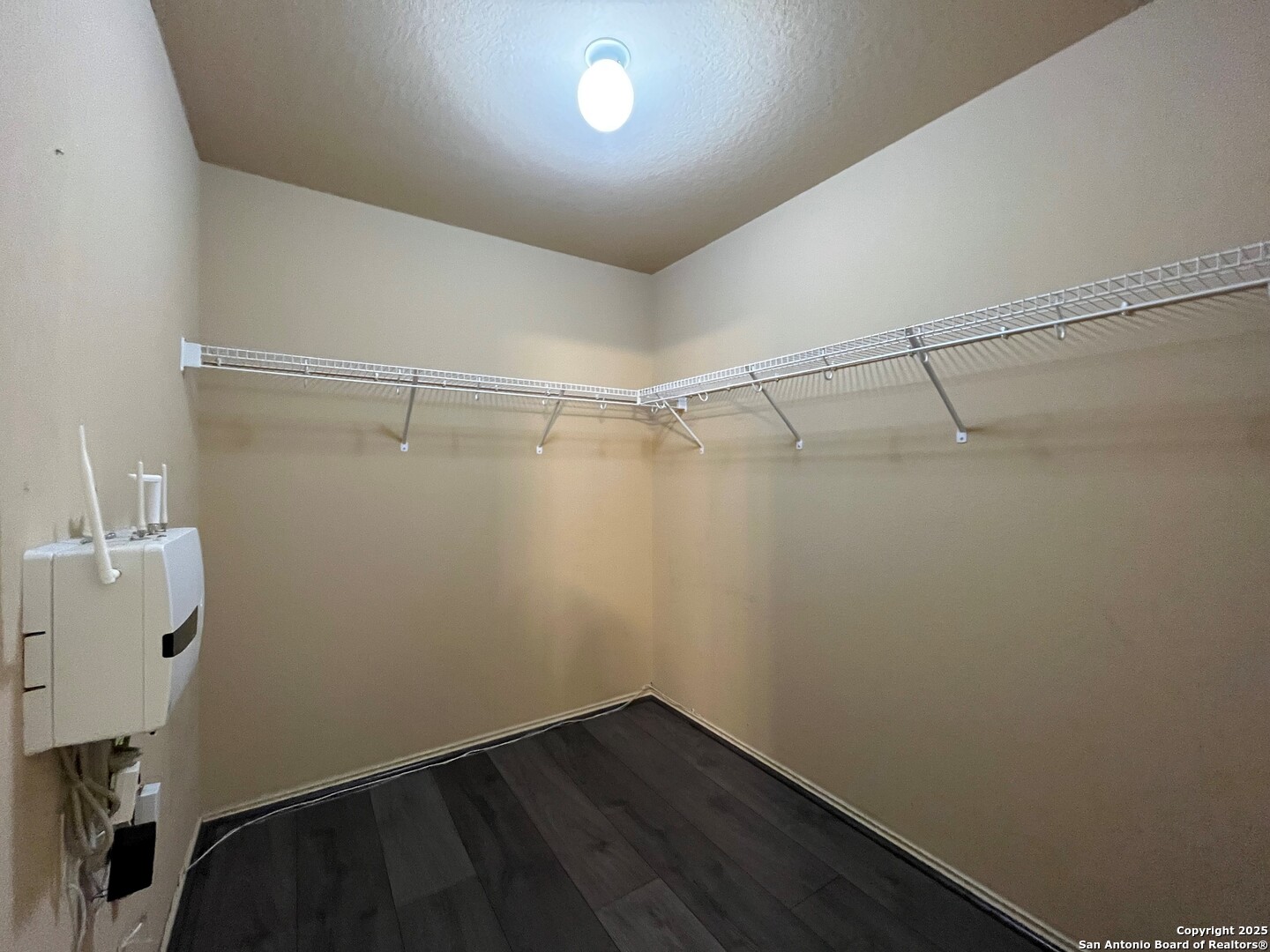 426 Tequila Ranch San Antonio, TX 78245 - Photo 19 of 24 a view of a room with racks on the wall