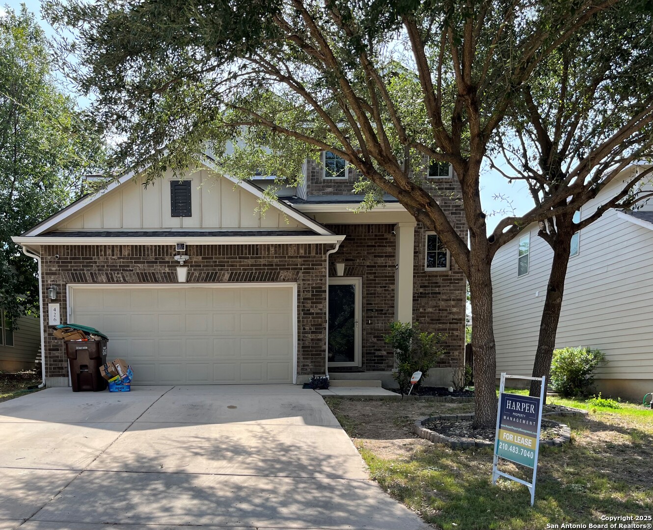 426 Tequila Ranch San Antonio, TX 78245 - Photo 2 of 25 a front view of a house with a garage