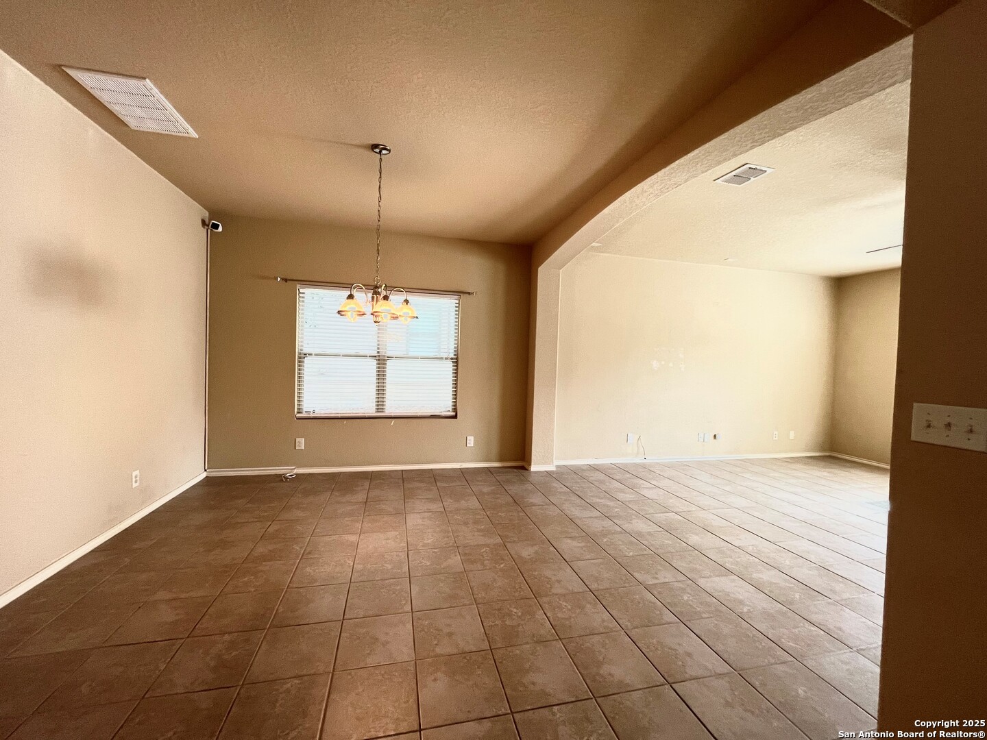 426 Tequila Ranch San Antonio, TX 78245 - Photo 9 of 24 a view of an empty room and window