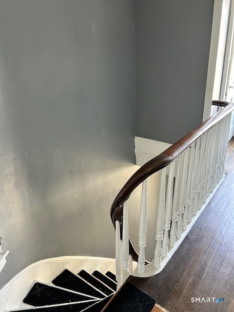 59 Park Place Middletown, CT 06457 - Photo 4 of 13 a view of staircase with railing and white walls