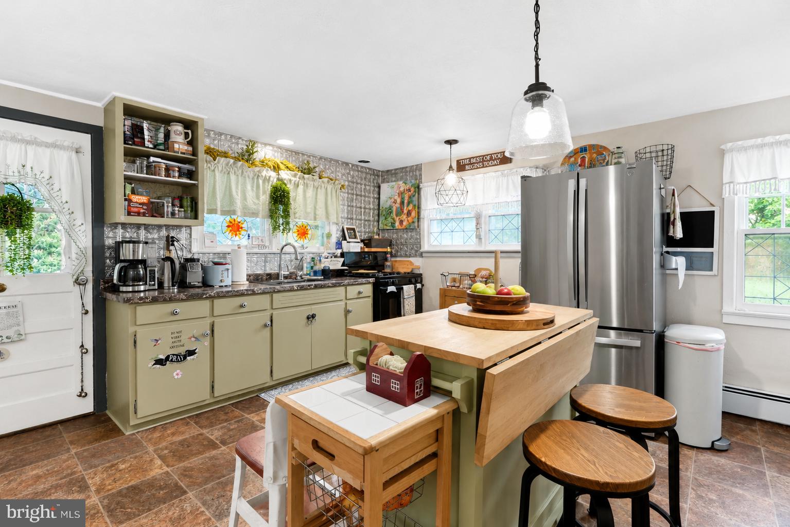 1470 River Road Titusville, NJ 08560 - Photo 28 of 50 a kitchen with a sink stove and refrigerator