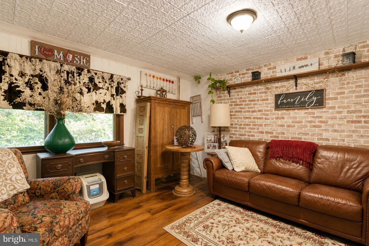 1470 River Road Titusville, NJ 08560 - Photo 29 of 50 a living room with furniture fireplace and flat screen tv