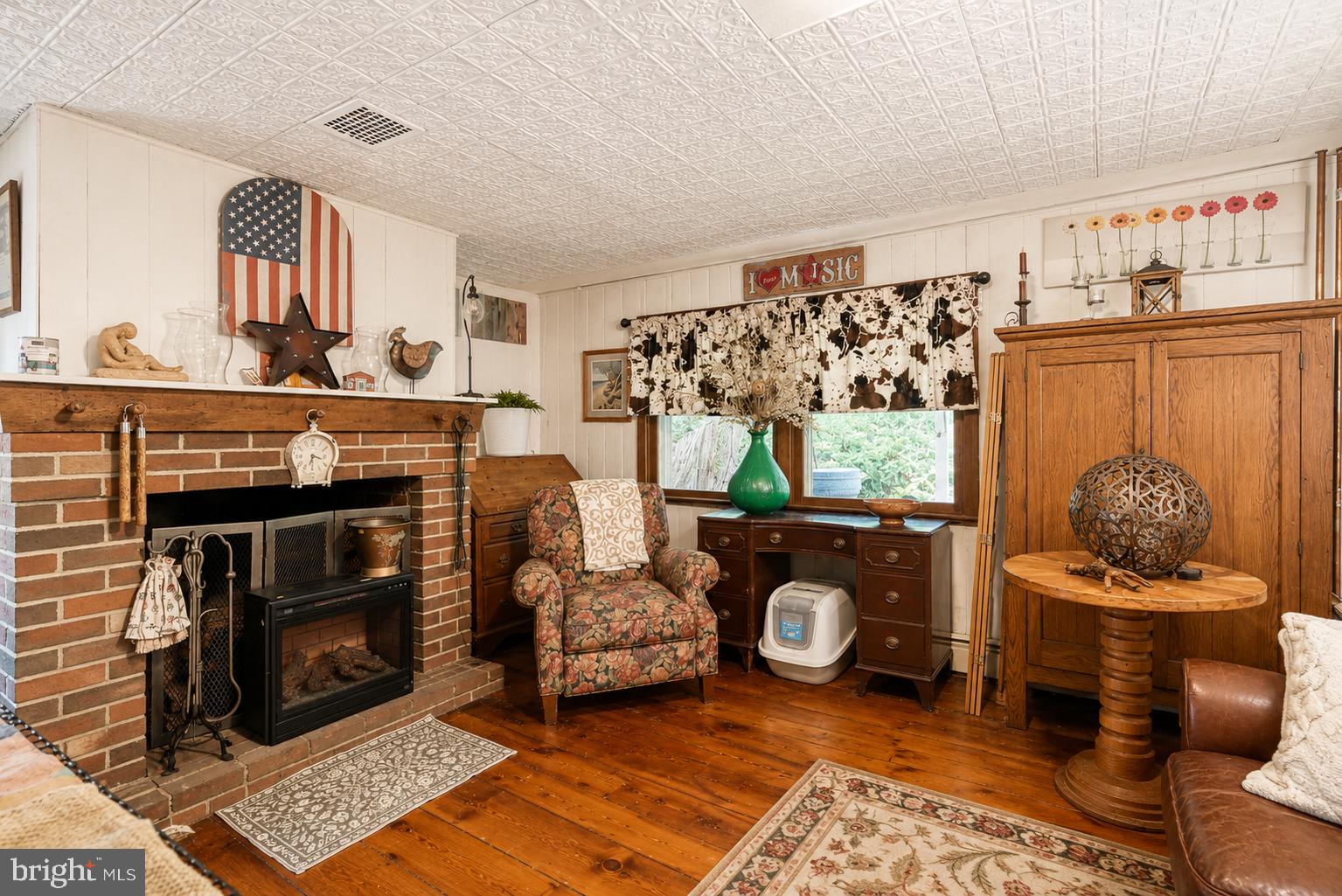 1470 River Road Titusville, NJ 08560 - Photo 30 of 50 a living room with furniture and a fireplace