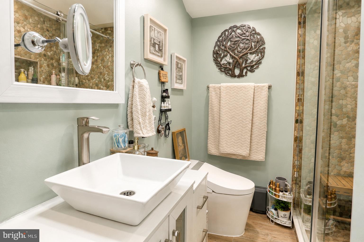 1470 River Road Titusville, NJ 08560 - Photo 43 of 50 a bathroom with a sink a toilet and a mirror