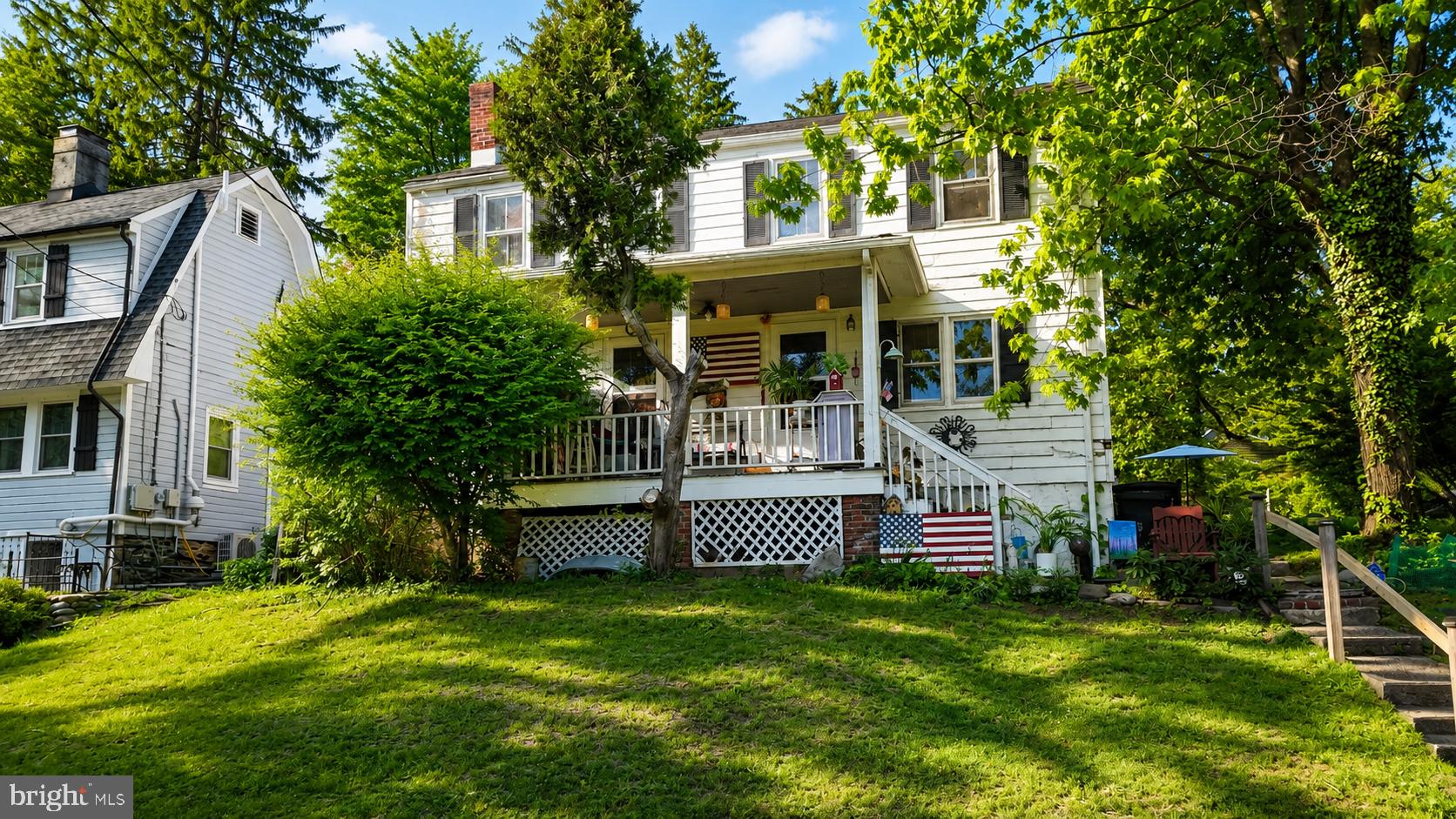 1470 River Road Titusville, NJ 08560 - Photo 9 of 50 a front view of a house with a yard table and chairs
