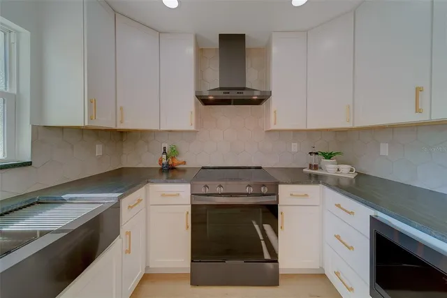 $549,900 | 1837 Sourwood Boulevard, Dunedin, FL 34698