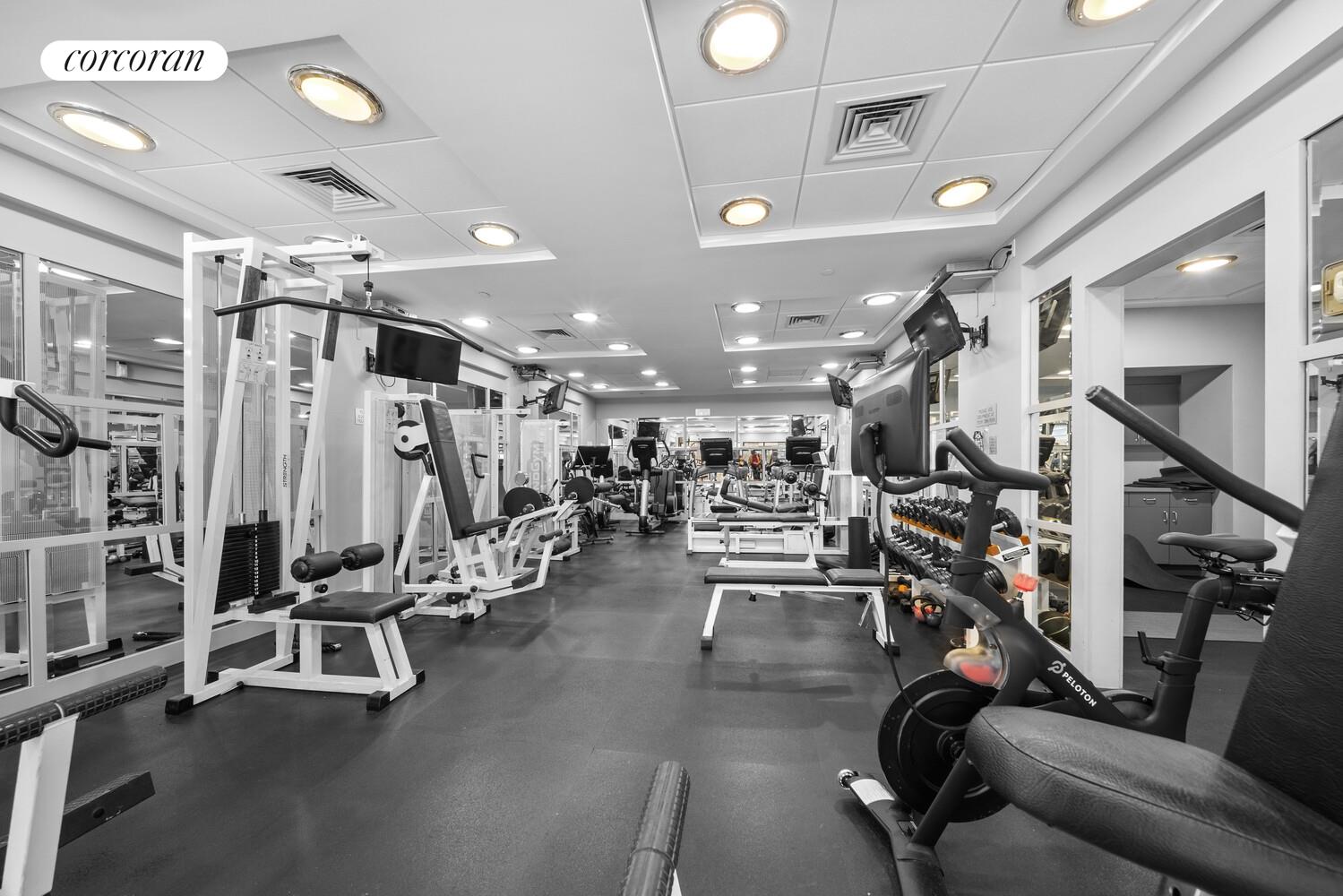 404 East 76th Street, Unit 3D Manhattan, NY 10021 - Photo 12 of 14 a view of a room with gym equipment