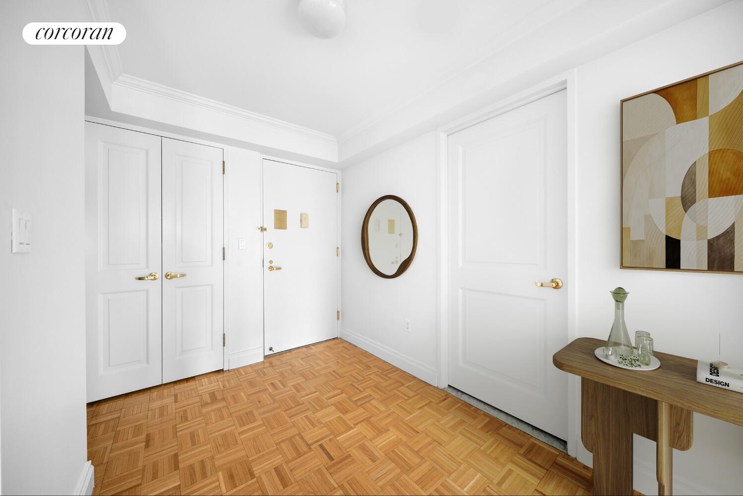 404 East 76th Street, Unit 3D Manhattan, NY 10021 - Photo 7 of 14 a bedroom with a bed and a table in it