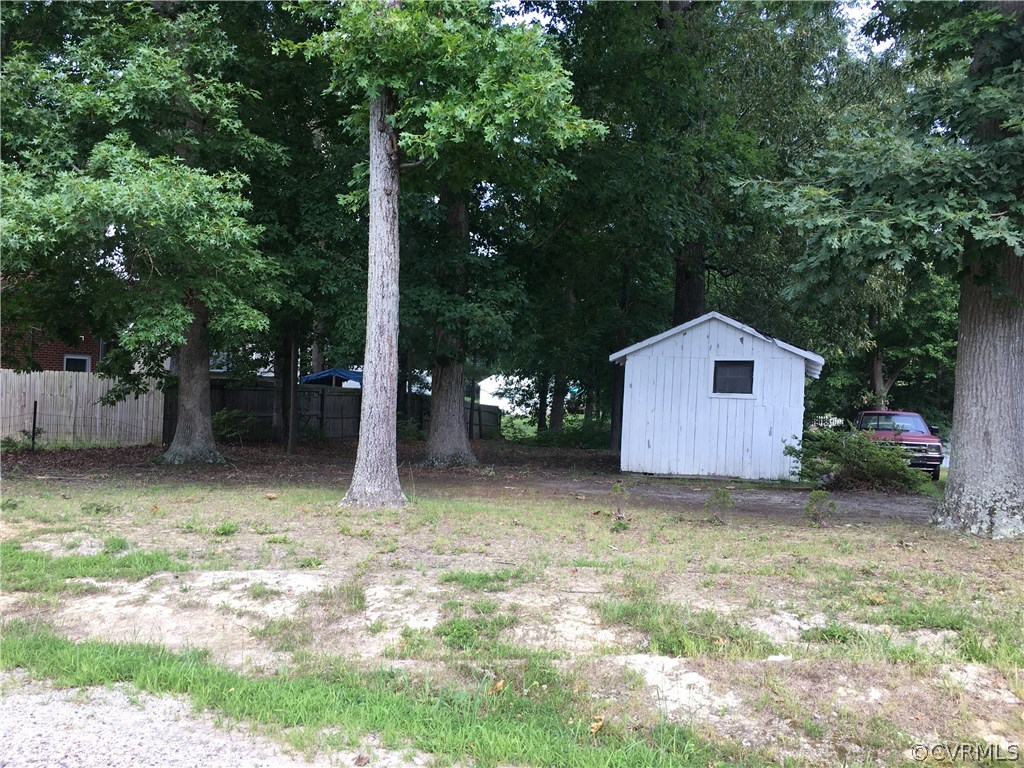 9005 Carswell Street North Chesterfield, VA 23237 - Photo 2 of 3 a view of a house with a yard