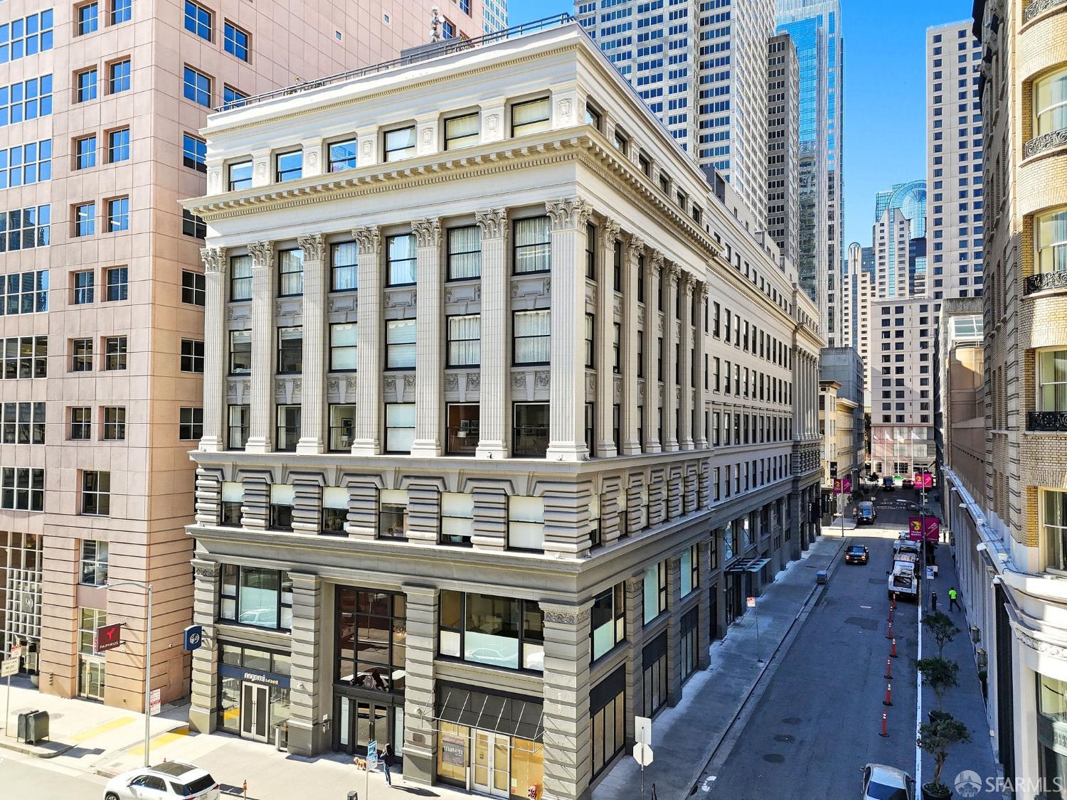 74 New Montgomery Street, Unit 211 San Francisco, CA 94105 - Photo 15 of 22 a front view of a building with balcony