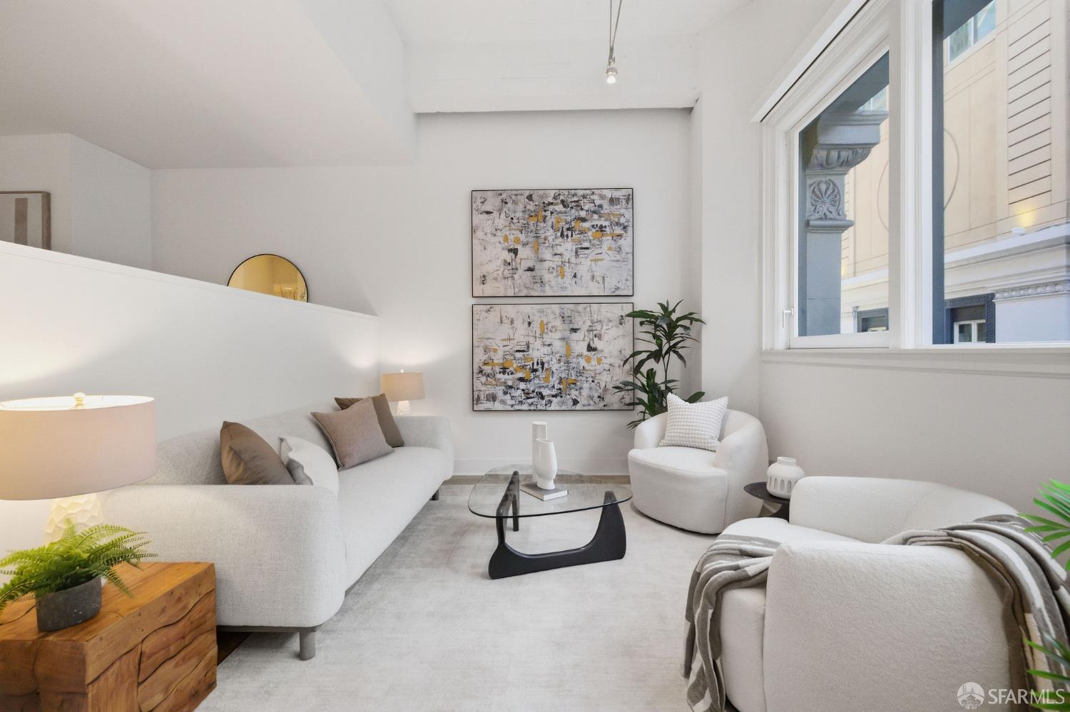 74 New Montgomery Street, Unit 211 San Francisco, CA 94105 - Photo 2 of 22 a living room with furniture flowerpot and window